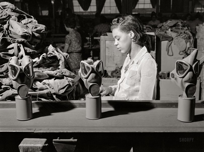June 1942. "Edgewood Arsenal, Maryland. Gas demonstration. Reconditioning gas masks at the gas mask factory." Medium format acetate negative by Jack Delano. View full size.
