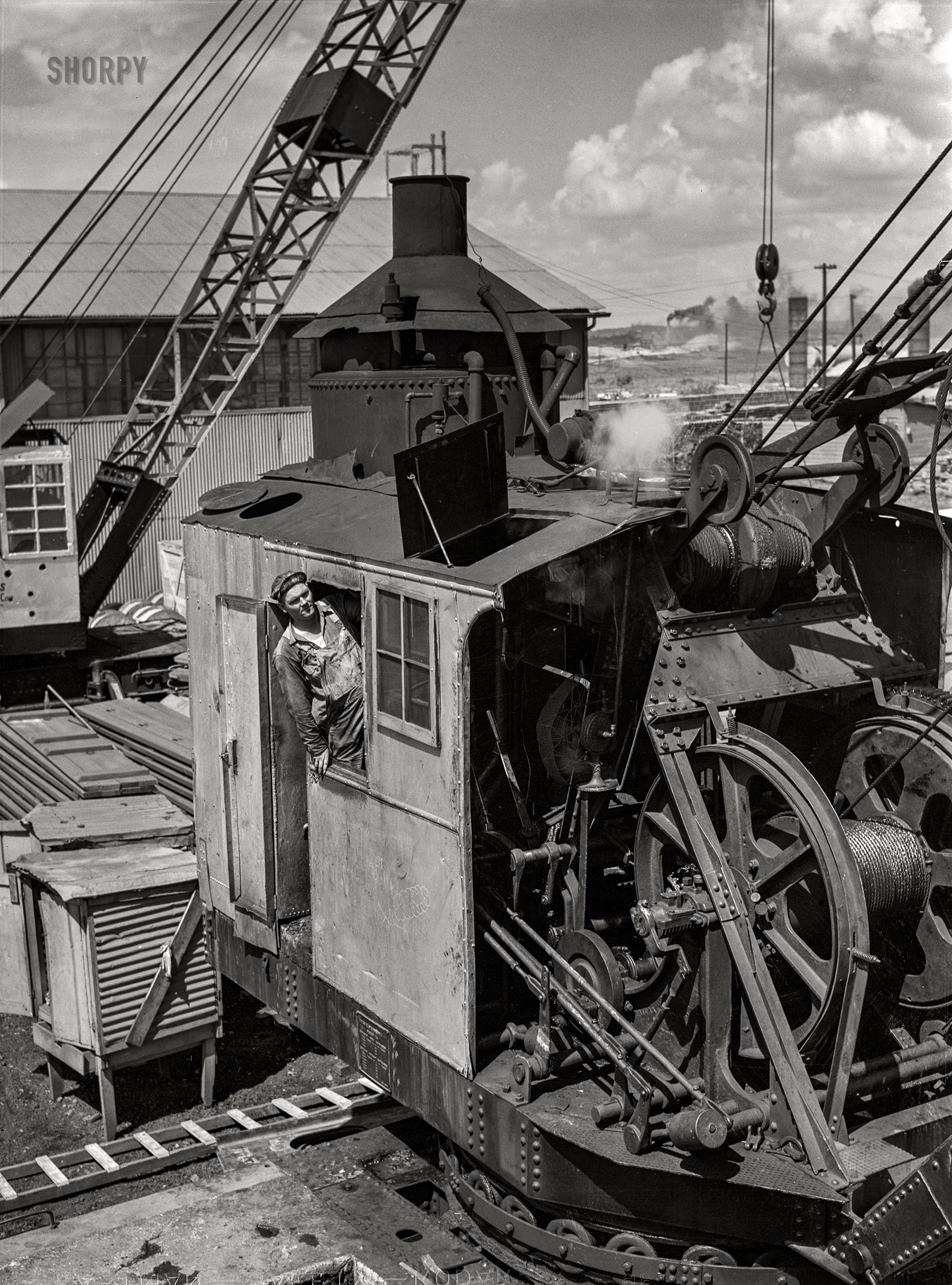 July 1942. "Decatur, Alabama. Ingalls Shipbuilding Company. A crane operator." Acetate negative by Jack Delano for the Office of War Information. View full size.