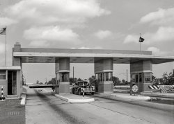 July 1942. "Pennsylvania Turnpike, Pennsylvania. Toll booths." Medium format acetate negative by Arthur Rothstein for the Office of War Information. View full size.