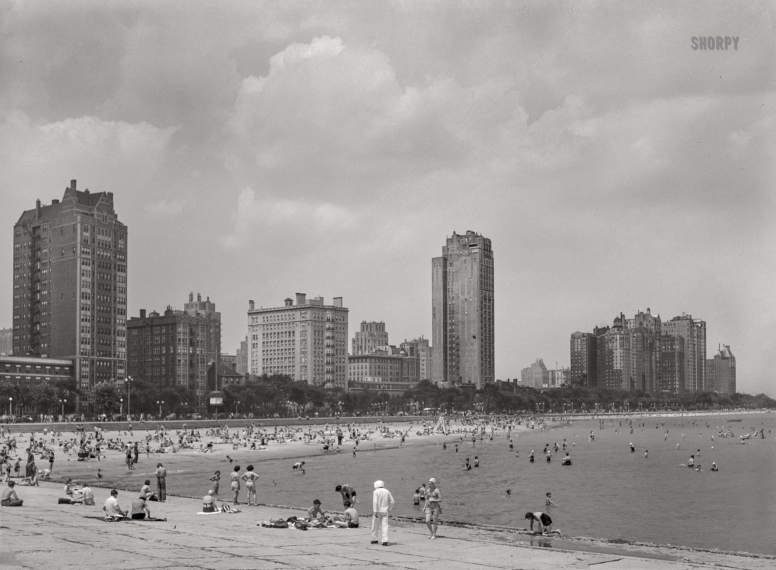 July 1942. "Chicago, Illinois. Lake Michigan beach." Medium format acetate negative by Arthur Rothstein for the U.S. Foreign Information Service. View full size.