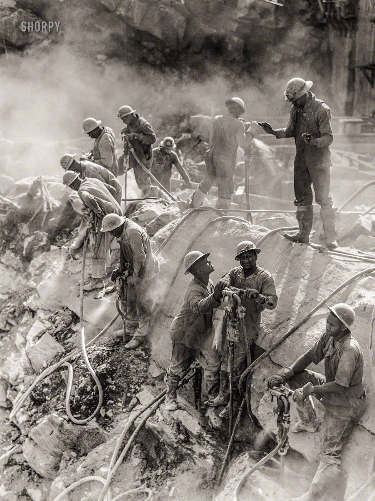 August 1942. "Fort Loudoun Dam -- Tennessee Valley Authority drillers." Photo by Jack Delano for the Office of War Information. View full size.