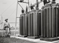 July 1942. "Hayti, Missouri. U.S. Rural Electrification Administration (REA) lineman examining transformers of a substation." Acetate negative by Arthur Rothstein for the OWI. View full size.