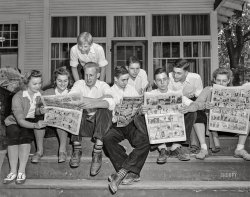 August 9, 1942. "Interlochen, Michigan. National music camp where 300 or more young musicians study symphonic music for eight weeks each summer. Reading the funny papers on Sunday morning." Medium format acetate negative by Arthur S. Siegel. View full size.