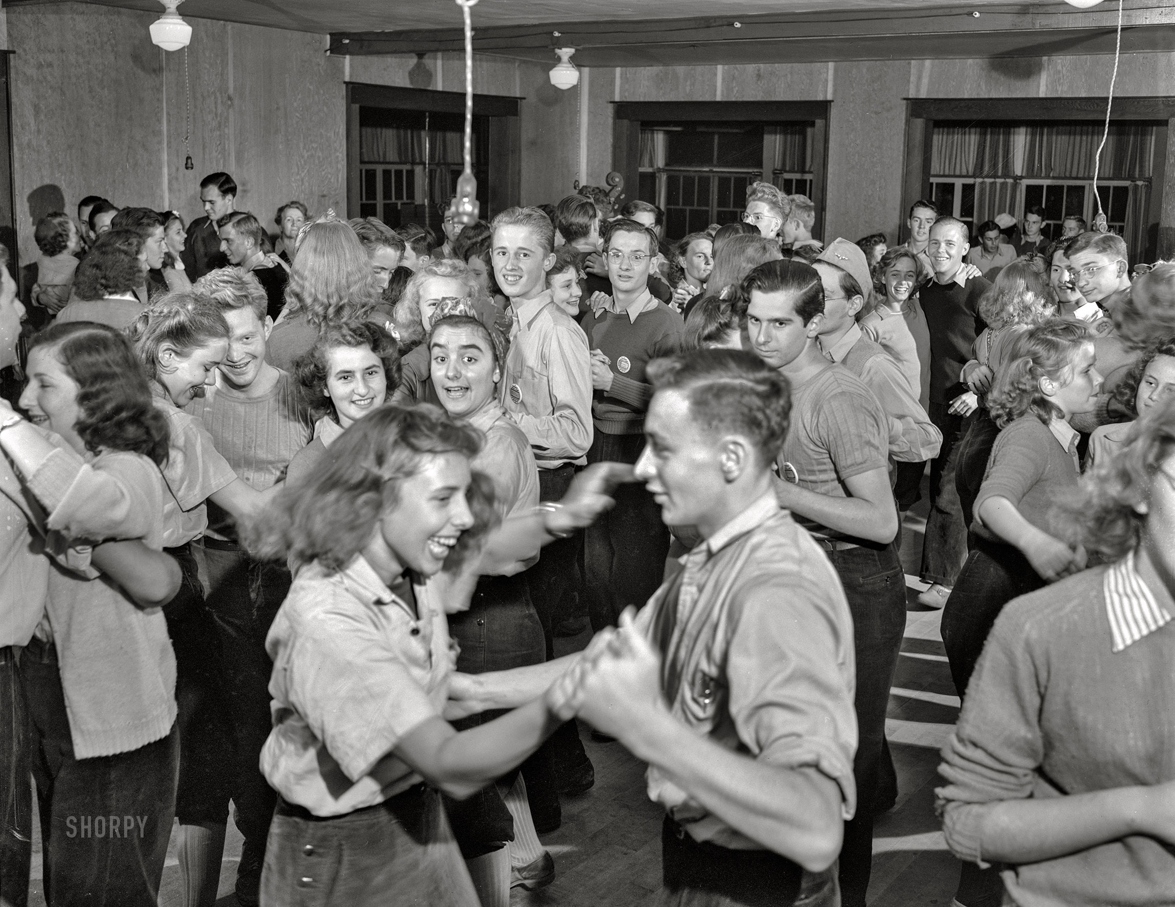 August 1942. "Interlochen, Michigan. National Music Camp, where some 300 young musicians study symphonic music for eight weeks each summer. Dance jamboree on a Monday night." Acetate negative by Arthur S. Siegel for the U.S. Foreign Information Service. View full size.