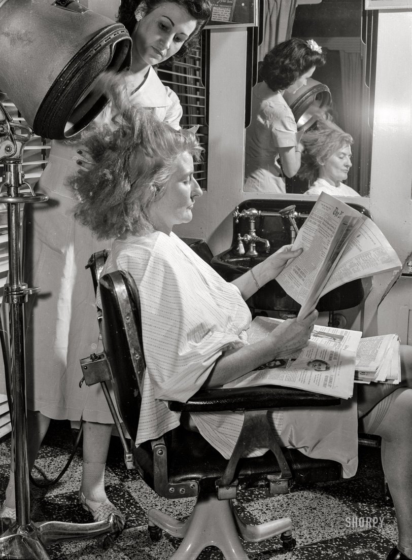 August 14, 1942. "New York. Drying hair after dyeing it at Francois de Paris, a hairdresser on West Eighth Street." Photo by Marjory Collins for the Office of War Information. View full size.