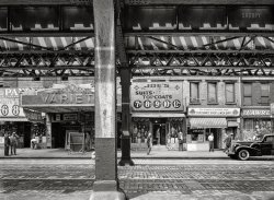 September 1942. "New York, New York. Under the Third Avenue elevated railway." Starring Joe's Clothes Shop and the Variety Theatre, which had a bit part in the movie "Taxi Driver." Acetate negative by Marjory Collins for the Office of War Information. View full size.