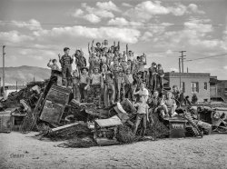 October 1942. "Butte, Montana. Schoolchildren on a pile of scrap which they gathered during the salvage campaign." Photo by Russell Lee for the Office of War Information. View full size.