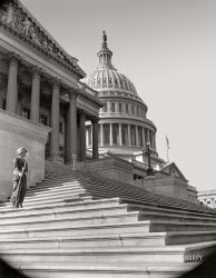 Washington, D.C.,  circa 1942. "U.S. Capitol, East Front. Sentry posted outside of House chamber." Medium format acetate negative, Office of War Information. View full size.