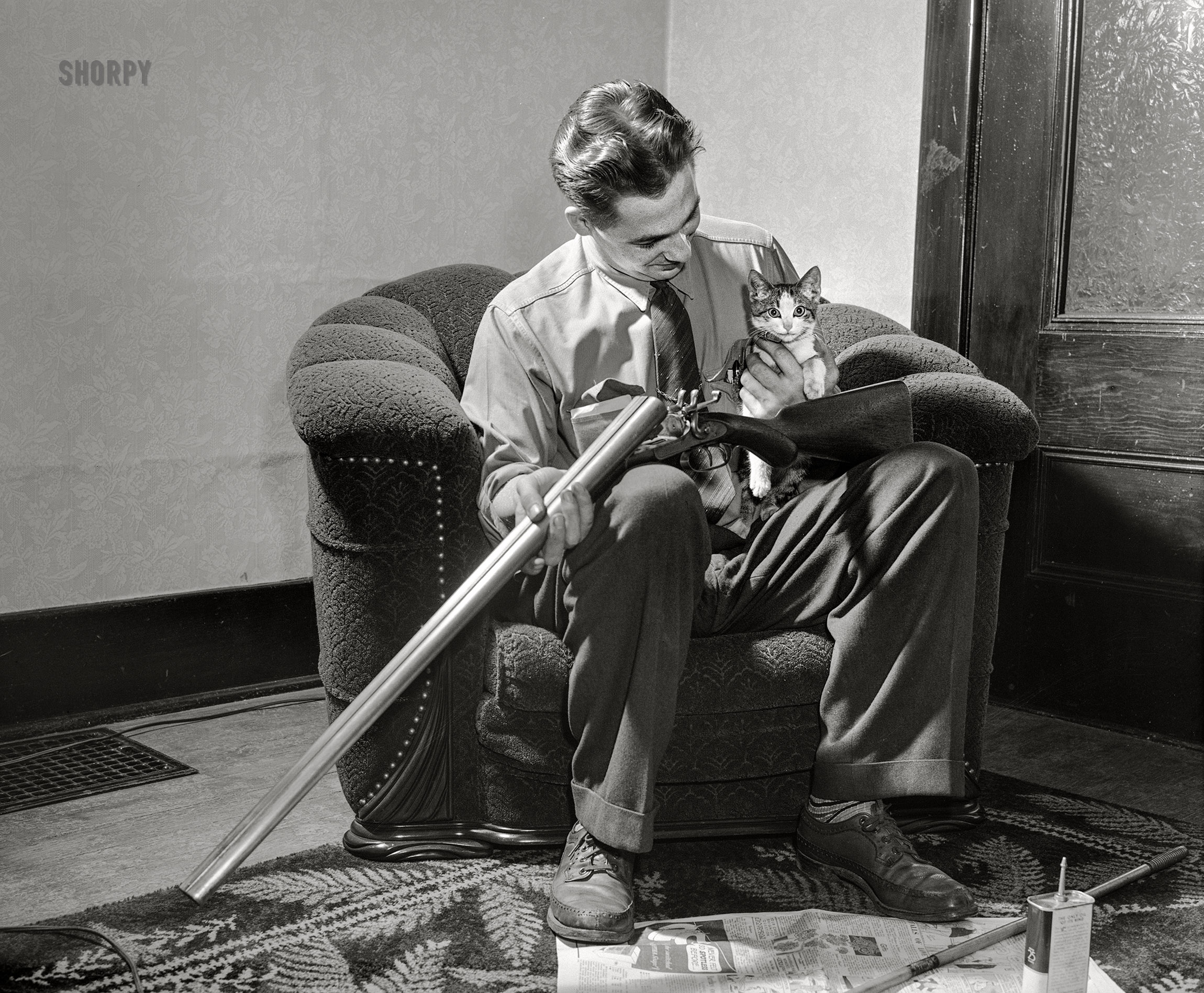November 1942. "Pittsburgh, Pennsylvania (vicinity). Montour No. 4 mine of the Pittsburgh Coal Company. Assistant superintendent getting ready for a hunting trip." Medium format acetate negative by John Collier for the Office of War Information. View full size.
