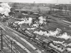 November 1942. "Chicago, Illinois. Locomotives in an Illinois Central Railroad yard." Medium format acetate negative by Jack Delano for the Office of War Information. View full size.