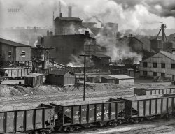 November 1942. "Pittsburgh, Pennsylvania (vicinity). Champion No. 1 coal cleaning plant of Pittsburgh Coal Company." Photo by John Collier, Office of War Information. View full size.
The graffitiAn absence of them on the wagons is deafening. 
EponymyThe subject is coal-related and the photographer's name is coal-related
(The Gallery, John Collier, Mining, Pittsburgh, Railroads, WW2)