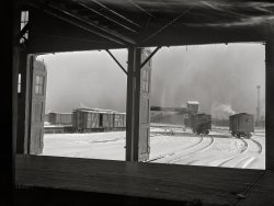 December 1942. "Chicago, Illinois. Switching and classification freight yards. Looking out toward the icehouse from the freighthouse at a yard of the Chicago and North Western Railroad." Acetate negative by Jack Delano for the Office of War Information. View full size.
(The Gallery, Chicago, Jack Delano, Railroads)