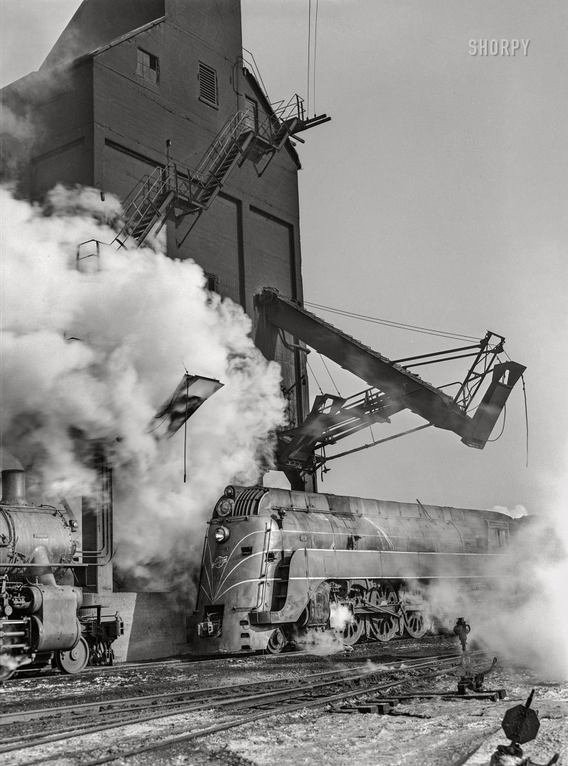December 1942. "Chicago, Illinois. Chicago &amp; North Western Railroad switching and classification freight yards. Locomotives at the coaling station." Acetate negative by Jack Delano for the Office of War Information. View full size.

