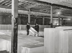 January 1943. Blue Island, Illinois. "Inside the ice storehouse of the Indiana Harbor Belt Railroad near Chicago. It has a storage capacity of almost 15,000 tons." Medium format acetate negative by Jack Delano for the Office of War Information. View full size.