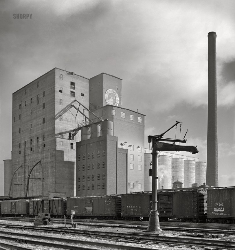 January 1943. Riverdale, Illinois. "Freight operations of the Indiana Harbor Belt Railroad. Grain elevator and mill at a siding of the Harbor Belt's Blue Island Yard south of Chicago." Medium format acetate negative by Jack Delano for the Office of War Information. View full size.