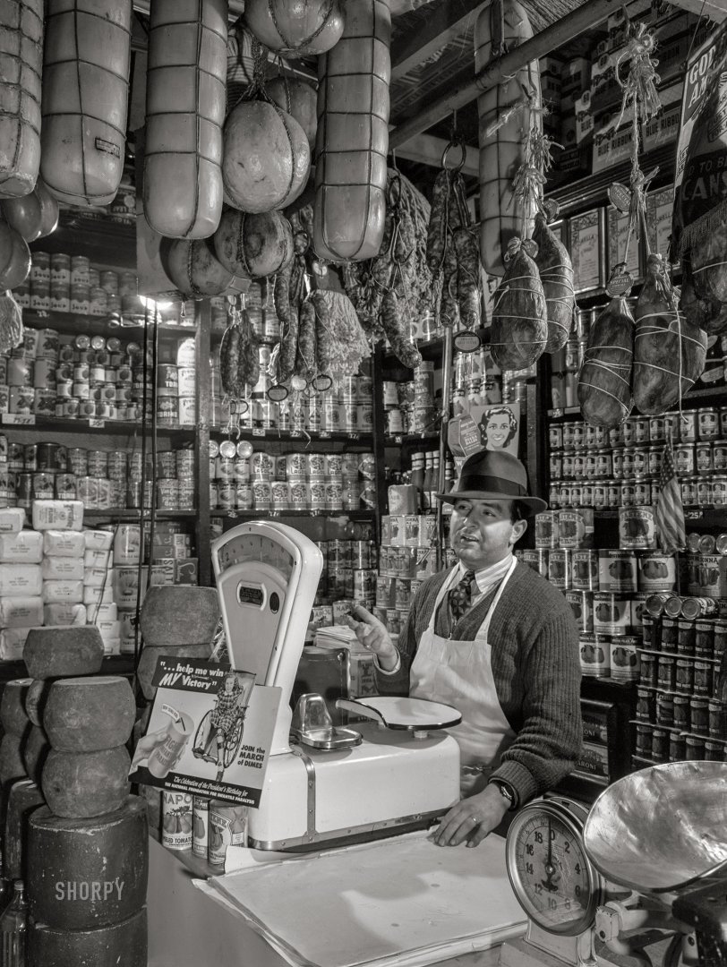 January 1943. "New York, New York. Italian-Americans on the Lower East Side of Manhattan. Italian grocery store owned by the Ronga brothers on Mulberry Street." Acetate negative by Marjory Collins for the Office of War Information. View full size.