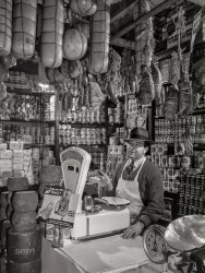 January 1943. "New York, New York. Italian-Americans on the Lower East Side of Manhattan. Italian grocery store owned by the Ronga brothers on Mulberry Street." View full size.