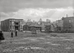 February 1942. "Detroit, Michigan. Looking towards downtown from the slum area in the early morning. These are conditions under which families lived before moving to the Sojourner Truth housing project." 4x5 acetate negative by Arthur Siegel for Life magazine. View full size.
(The Gallery, Arthur Siegel, Detroit Photos, Kids)
