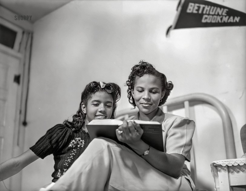 February 1943, "Daytona Beach, Florida. Bethune-Cookman College. Girls in the dormitory. Each calls the other 'Roomy'." Photo by Gordon Parks, Office of War Information. View full size.