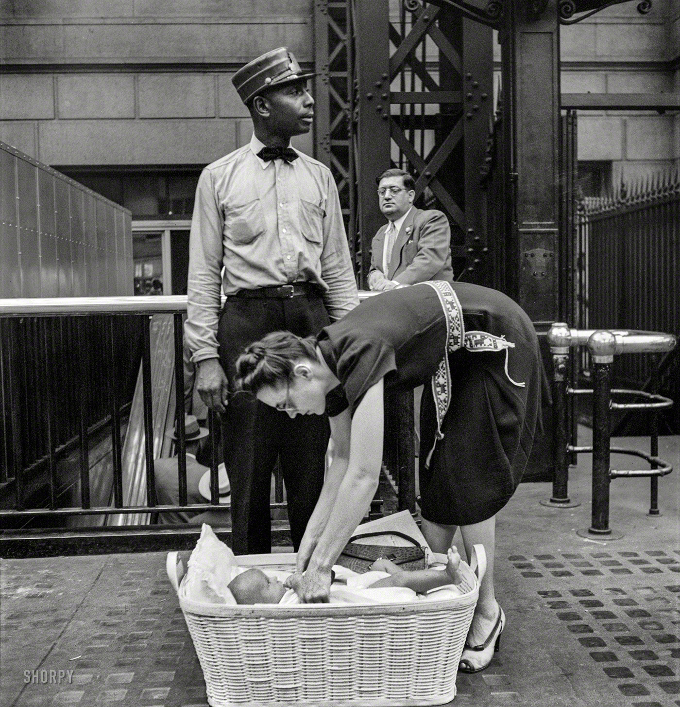 August 1942. "New York, New York. Waiting for trains at Pennsylvania Station." Photo by Marjory Collins for the Office of War Information. View full size.
