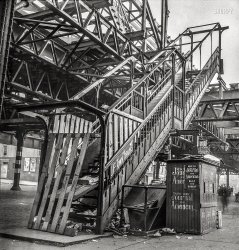 September 1942. New York. "Second Avenue elevated railway at 14th Street in the midst of demolition." Photo by Marjory Collins. View full size.