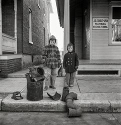 November 1942. Lititz, Pennsylvania. "Scrap collection drive. Each household placed its contribution on the sidewalk. It was then picked up by local trucks whose owners had volunteered their services for civilian defense. The scrap outside a plumber's house consists of pipes." (Kids not included.) Medium format negative by Marjory Collins for the Office of War Information. View full size.