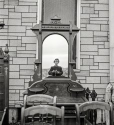 November 1942. "Lititz, Pennsylvania. Self-portrait at a public sale." Photo by Marjory Collins (1912-1985) for the Office of War Information. View full size.