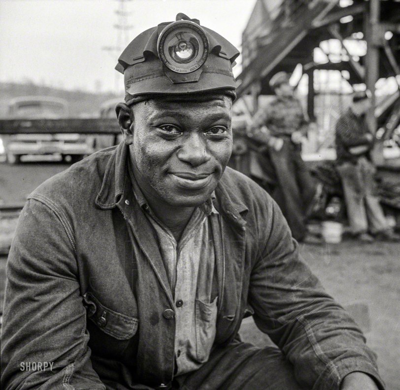 Every mornin' at the mine you could see him arrive
He stood six-foot-six and weighed two-forty-five
Kinda broad at the shoulder and narrow at the hip
And everybody knew ya didn't give no lip to big John

November 1942. "Pittsburgh (vicinity). Montour No. 4 mine of the Pittsburgh Coal Company. Coal miner waiting to go underground." Medium-format nitrate negative by John Collier for the Office of War Information. View full size.
