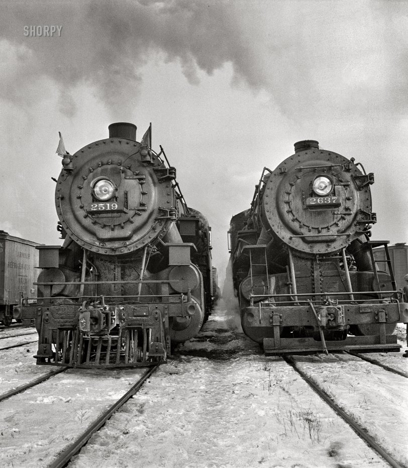 December 1942. "Locomotives in the Chicago and North Western departure yard about to leave for Clinton, Iowa." Medium-format negative by Jack Delano for the Office of War Information. View full size.