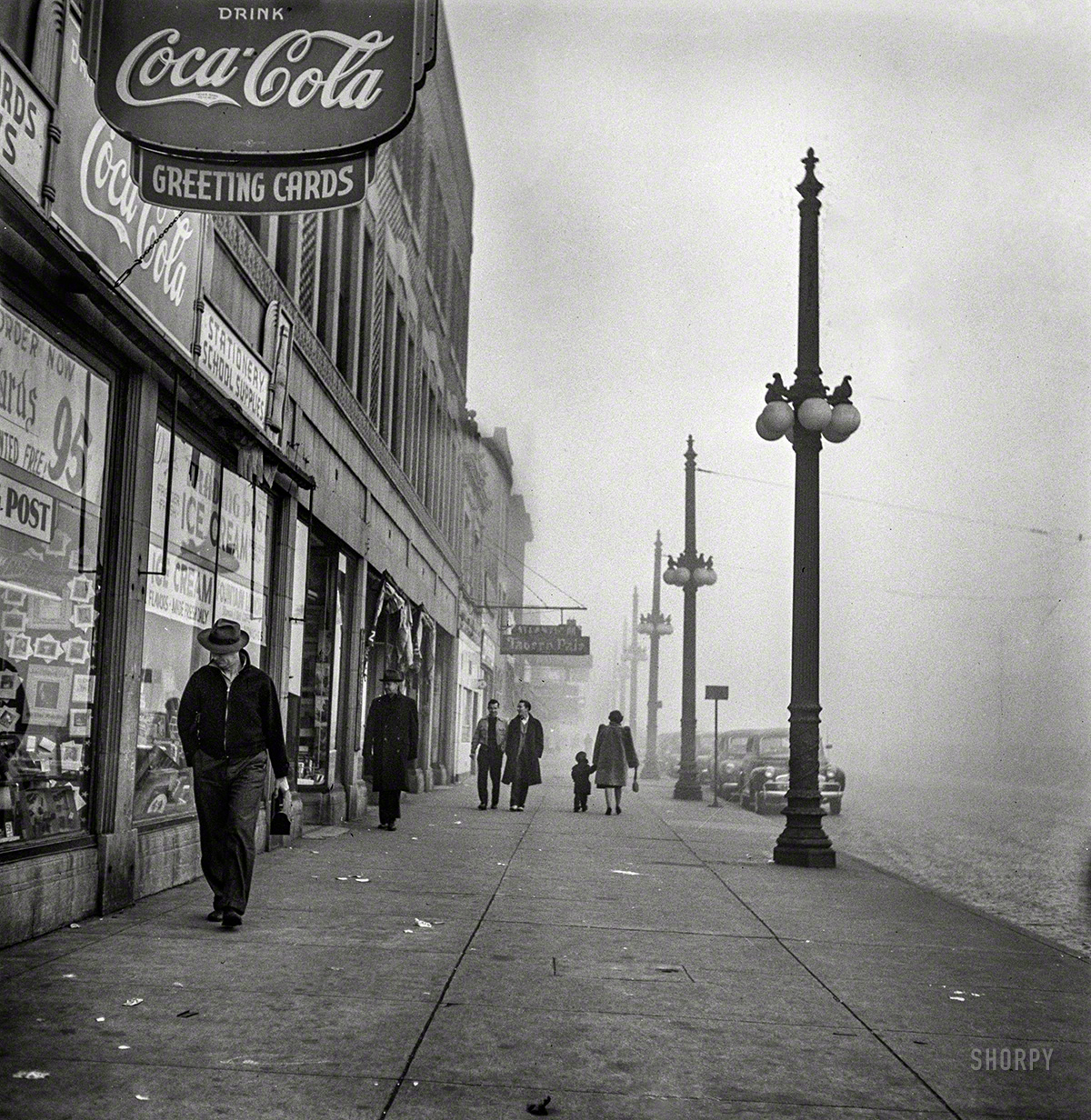 December 1942. "Chicago. An unusually heavy fog in the early afternoon." Medium format negative by Jack Delano, Office of War Information. View full size.