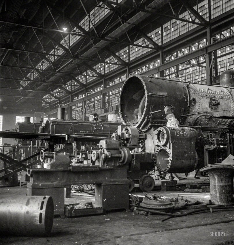 December 1942. "Chicago, Illinois. In the Chicago &amp; North Western locomotive repair shops." Photo by Jack Delano, Office of War Information. View full size.
