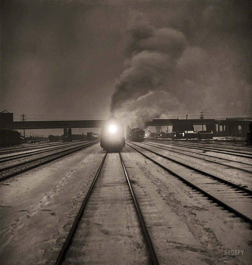 January 1943. "Freight operations on the Indiana Harbor Belt railroad between Chicago and Hammond, Indiana. At 8:45 p.m. the train arrives at its destination." Photo by Jack Delano for the Office of War Information. View full size.
