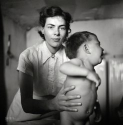 January 1943. Peñasco, New Mexico. "Marjorie Muller, nurse at baby clinic operated by the Taos County cooperative health association." Medium format nitrate negative by John Collier, Office of War Information. View full size.