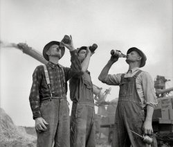 &nbsp; &nbsp; &nbsp; &nbsp; To agriculsha!
Fall 1941. "Jackson, Michigan. Threshing wheat. Farmers drinking beer." Photo by Arthur Siegel for the Farm Security Administration. View full size.