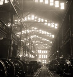 March 1943. "Fort Madison, Iowa. Shopton locomotive shops of the Atchison, Topeka &amp; Santa Fe Railroad." Photo by Jack Delano. View full size.
Cathedral of IndustryHard to believe that there have been no comments about this magical space from the train aficionados in Shorpy Land. 
(The Gallery, Jack Delano, Railroads)