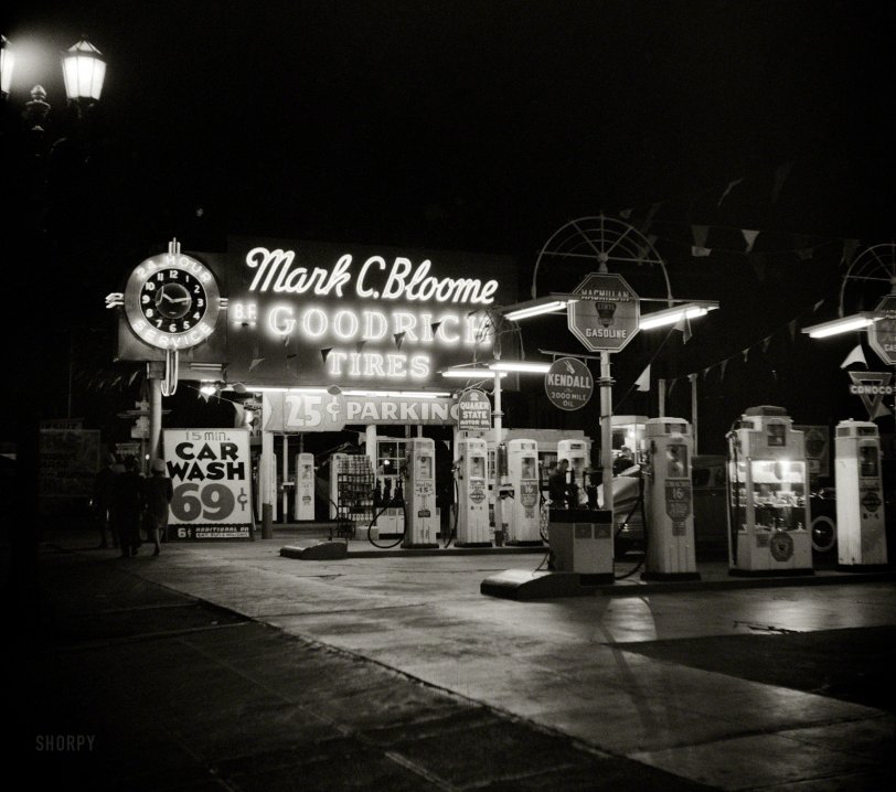 April 1942. "Hollywood, California. Gasoline filling station at night." Photo by Russell Lee for the Office of War Information. View full size.
