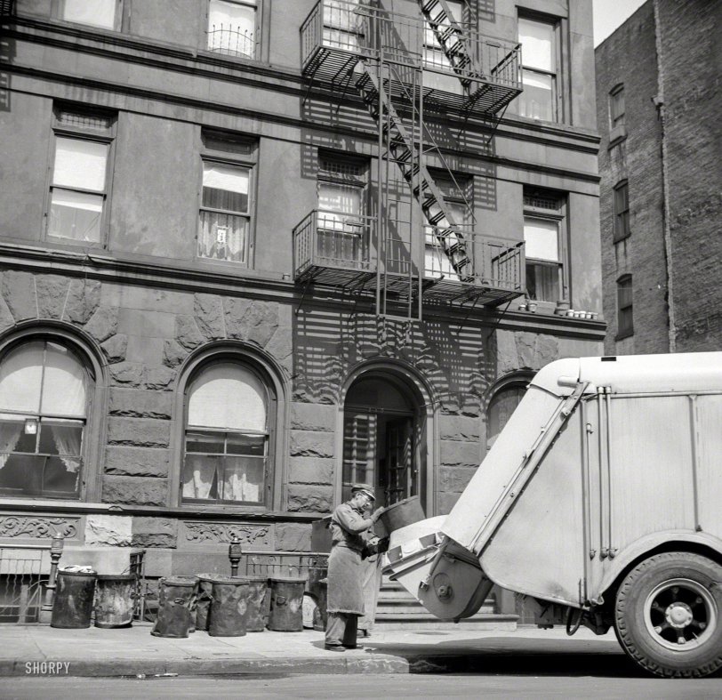 May 1943. "New York. Emptying garbage and trash from Harlem apartment houses." Photo by Gordon Parks, Office of War Information. View full size.
