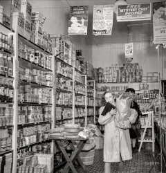 May 1943. Buffalo, New York. "Beverly Ann Grimm, 11, leaving the store after making the family purchases from a list left that morning by her widowed mother who is a crane operator at Pratt and Letchworth." Also: It's National Baby Week! Photo by Marjory Collins for the Office of War Information. View full size.