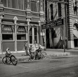 May 1943. "Galveston, Texas. Newspaper delivery boys." Medium format nitrate negative by John Vachon for the Office of War Information. View full size.