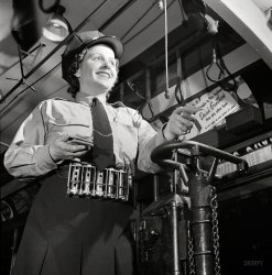June 1943. Washington, D.C. "Hattie B. Sheehan, a streetcar conductor for the Capital Transit Company." And if all you have is bills, no problem. Photo by Esther Bubley for the Office of War Information. View full size.