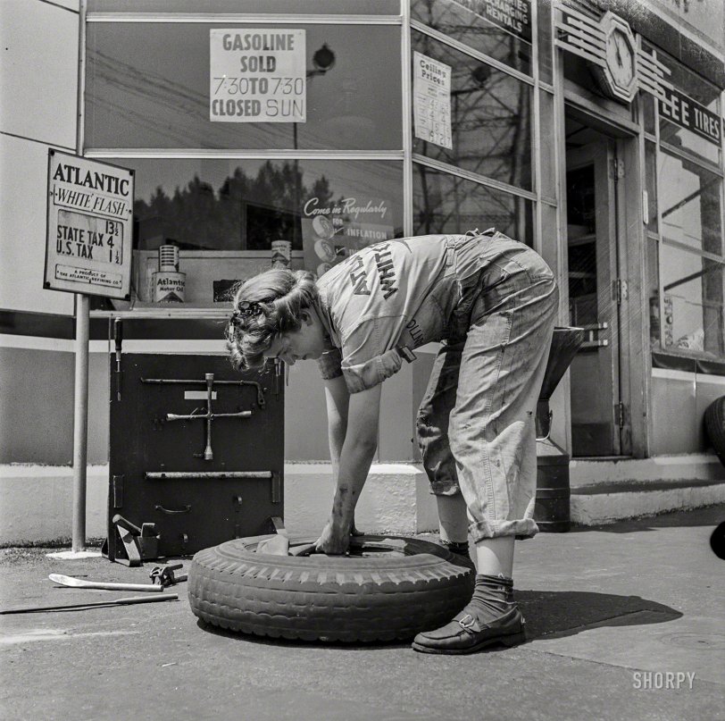 June 1943. "Philadelphia, Pennsylvania. Miss Natalie O'Donald, service station attendant at an Atlantic Refining Company garage." Medium-format negative by Jack Delano for the Office of War Information. View full size.

