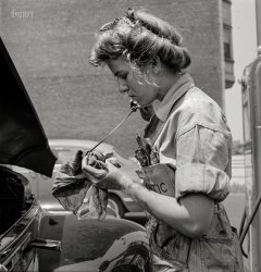 June 1943. Philadelphia, Pennsylvania. "Miss Natalie O'Donald, service-station attendant at the Atlantic Refining Company garages." Medium-format negative by Jack Delano for the Office of War Information. View full size.