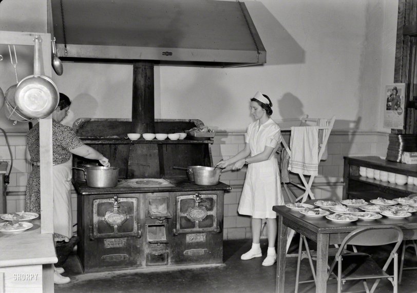 May 1943. "Keysville, Virginia. Randolph Henry High School. Kitchen of cafeteria. Lunches cost about 15 cents. Students don't have much money and they bring produce from farms and receive tickets." Photo by Philip Bonn. View full size.

