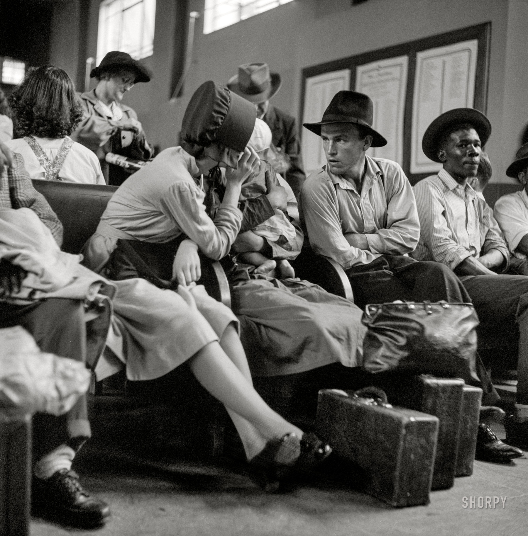 September 1943. "Pittsburgh, Pennsylvania. Passengers in the waiting room of the Greyhound bus station." Nitrate negative by Esther Bubley for the Office of War Information. View full size.
