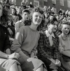 October 1943. "Washington, D.C. Football fans at Woodrow Wilson High School." Photo by Esther Bubley for the Office of War Information. View full size.