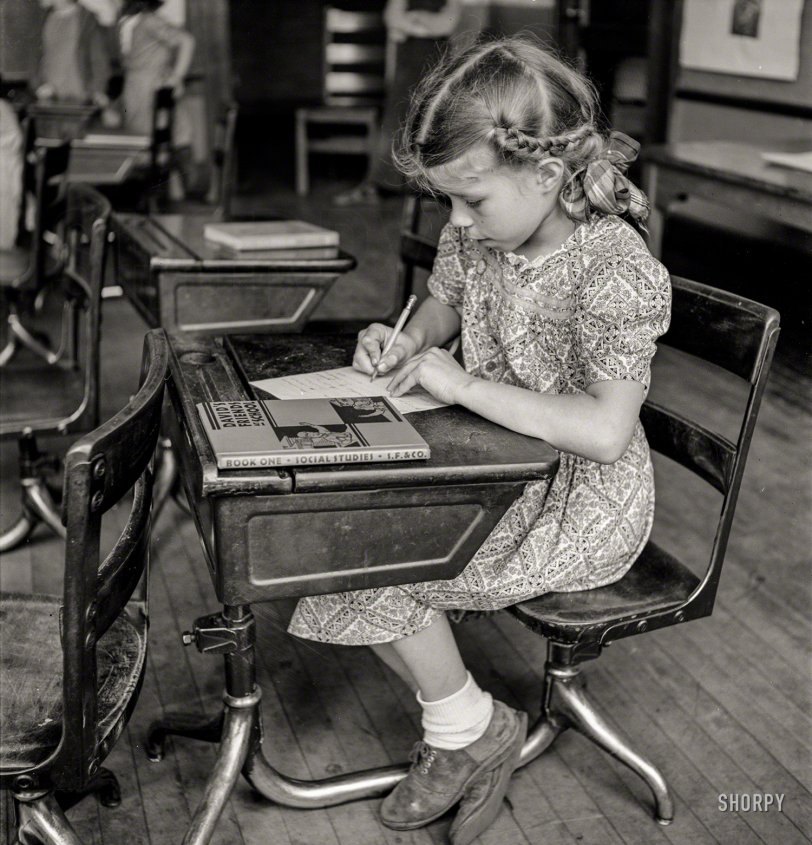 May 1940. Southington, Connecticut. "Schoolgirl studying." Medium format negative by Fenno Jacobs for the Office of War Information. View full size.
