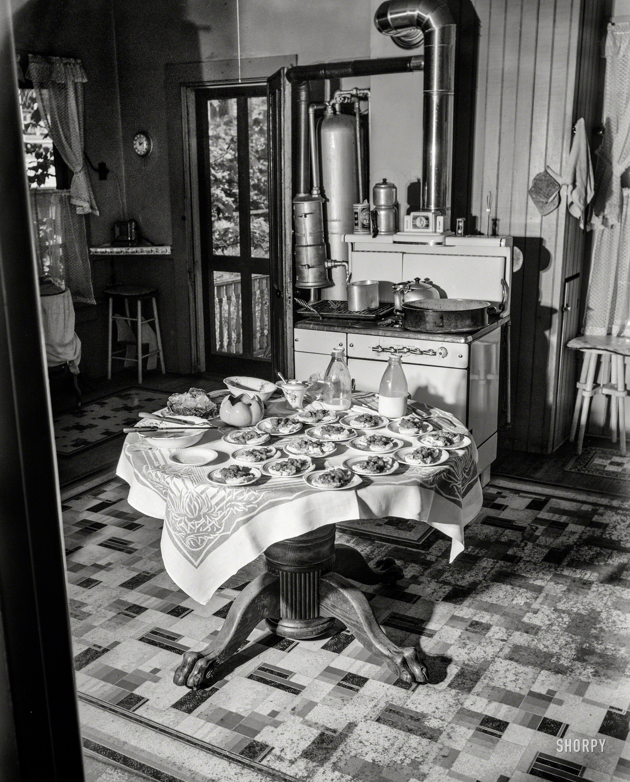 May 1942. "Southington, Connecticut. Preparations for Ralph Hurlbut's family dinner." Photo by Fenno Jacobs, Office of War Information. View full size.
