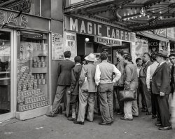 June 6, 1944. "New York, New York. Times Square and vicinity on D-Day." Photo by Howard Hollem et al. for the Office of War Information. View full size.