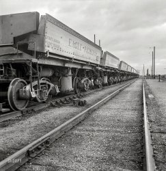 January 1943. "Production. Zinc. Cars for transporting zinc and lead ore. From the Eagle-Picher Mining & Smelting Co. plant near Cardin, Oklahoma, come great quantities of zinc and lead to serve many important purposes in the war effort." Photo by Fritz Henle for the Office of War Information. View full size.
