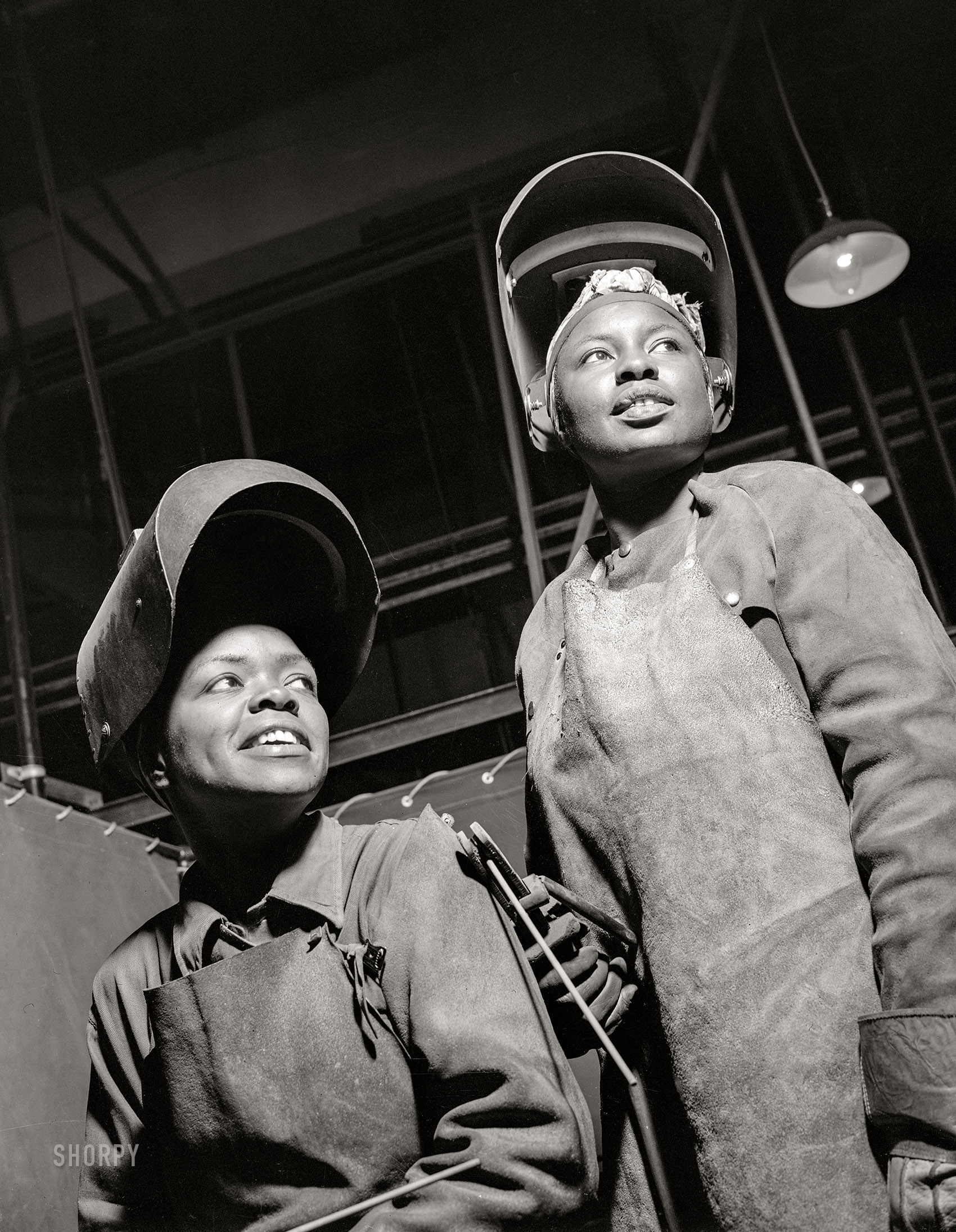 June 1943. "New Britain, Connecticut. Women welders at the Landers, Frary, and Clark plant." Acetate negative by Gordon Parks for the Office of War Information. View full size.